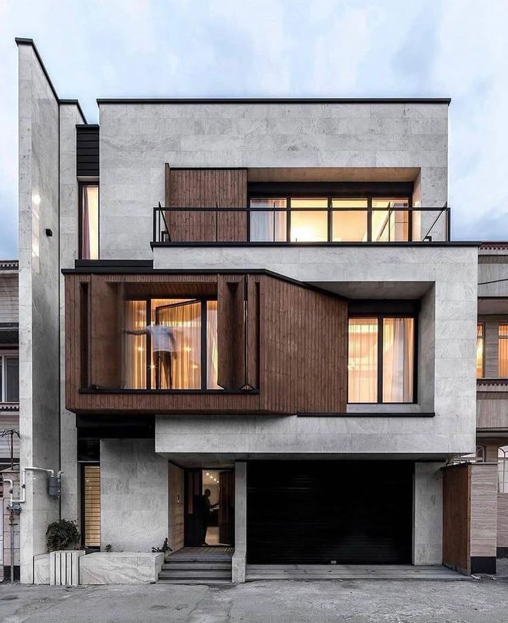 Desain rumah industrial modern dengan material ekspos beton dan besi